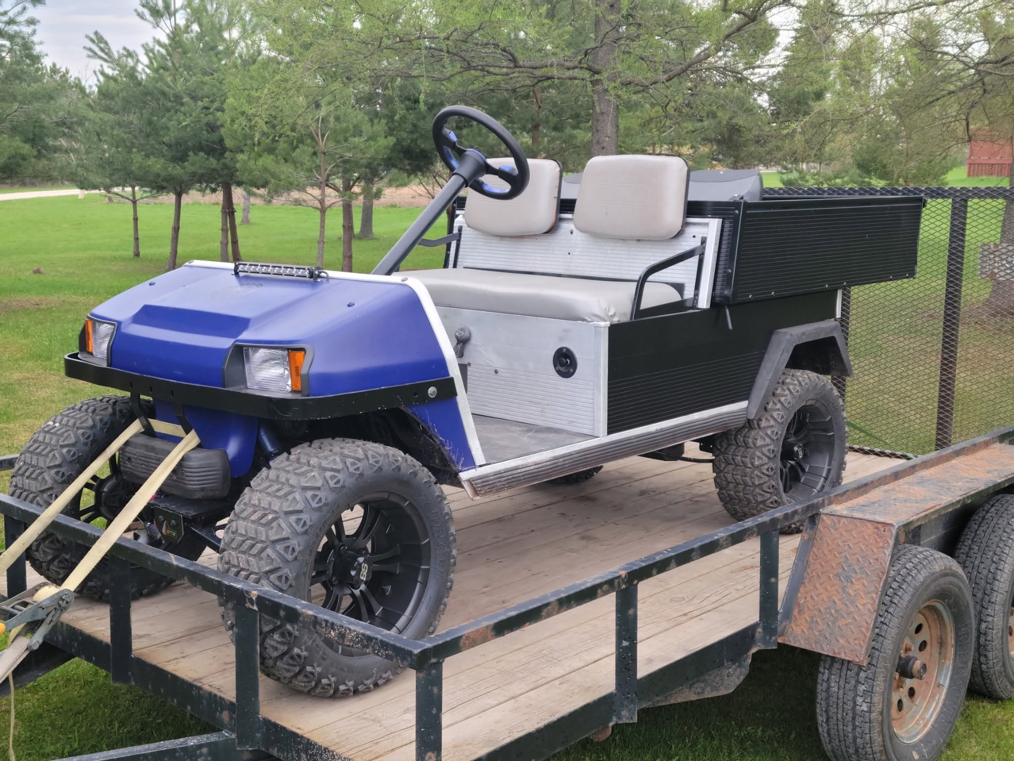 Custom golf cart on trailer